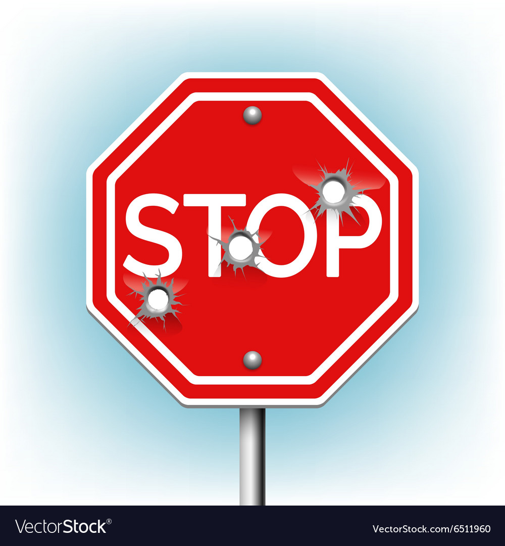 Stop sign with bullet holes