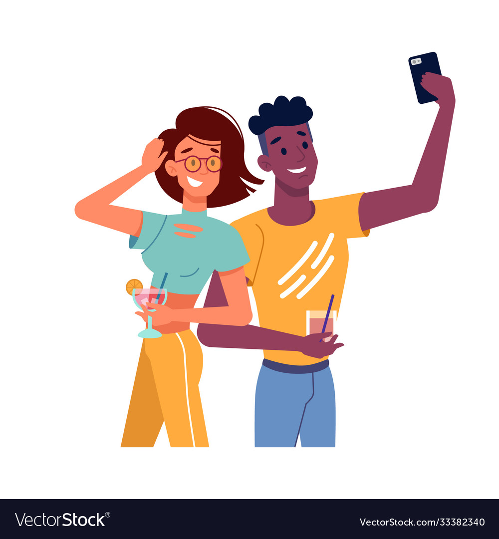 Guy and girl with cocktails taking selfie on phone