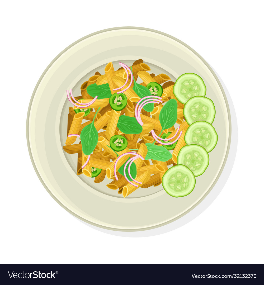 Vegetarian pasta with greenery and cucumber slices