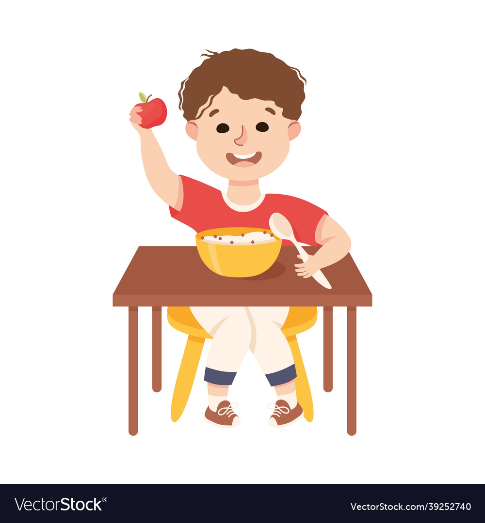 Little boy at kitchen table eating porridge Vector Image