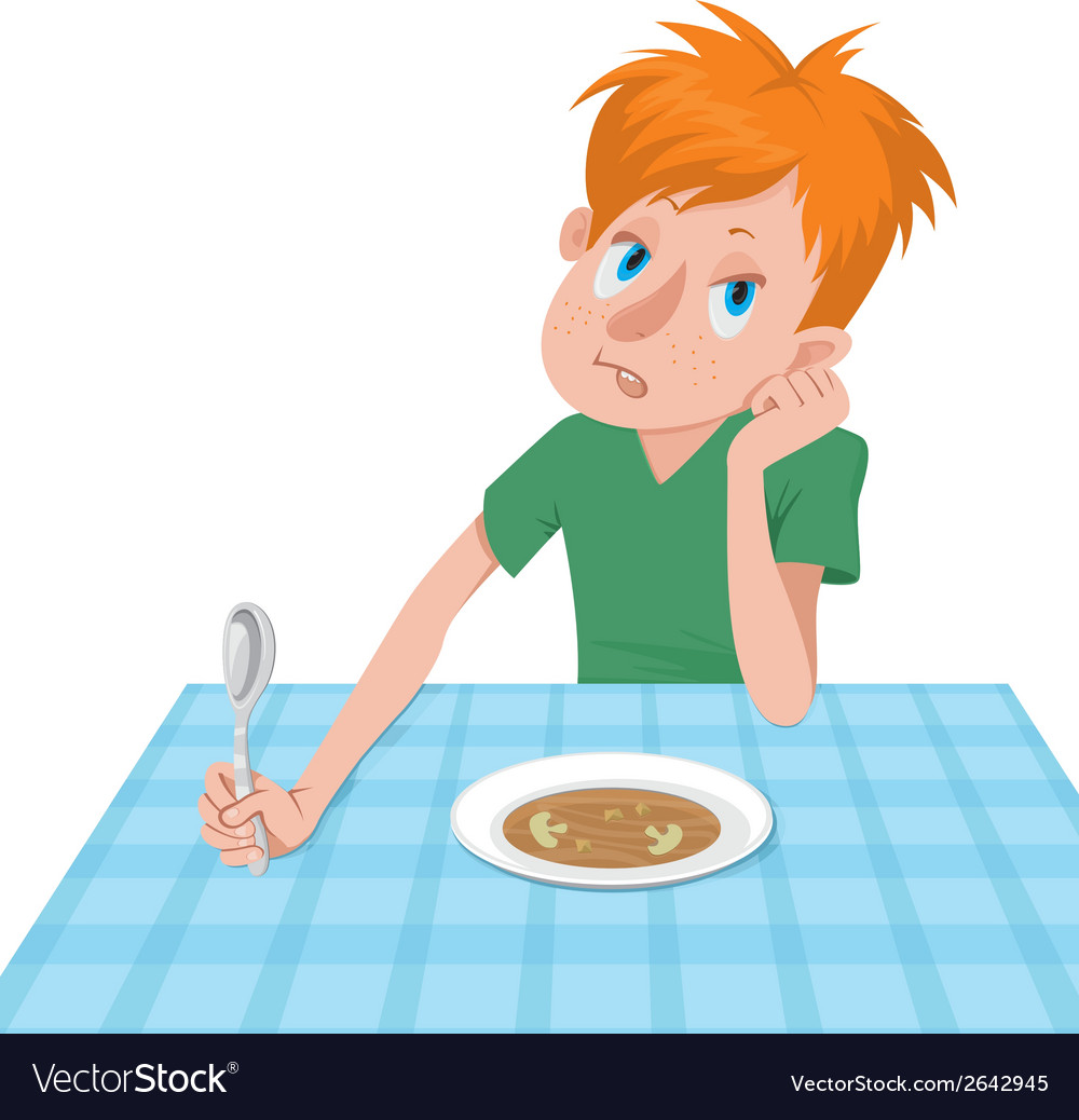 Boy eating at a table