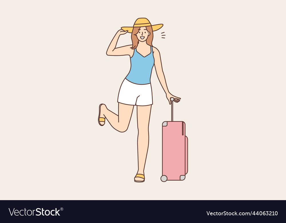 Smiling woman with suitcase ready for travel