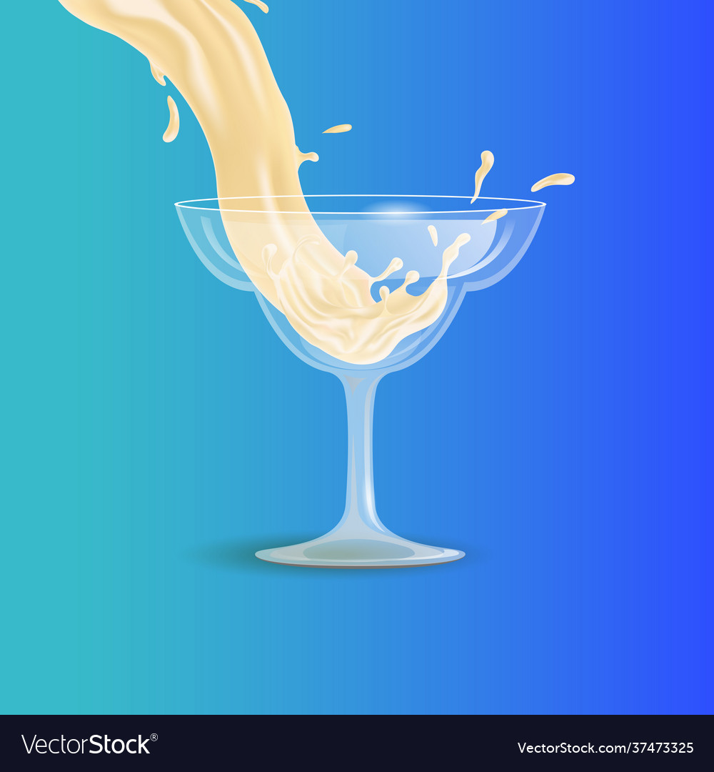 White beverage pouring into transparent cocktail