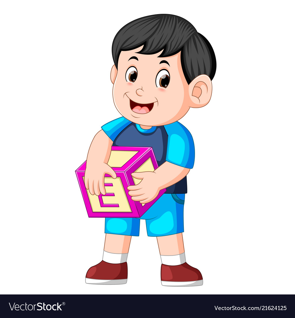 Cute boy holding alphabet cube