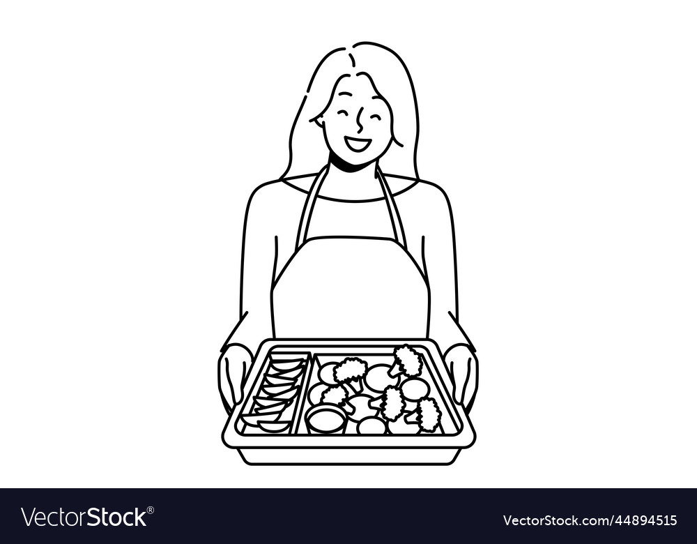 Smiling woman in apron cooking food