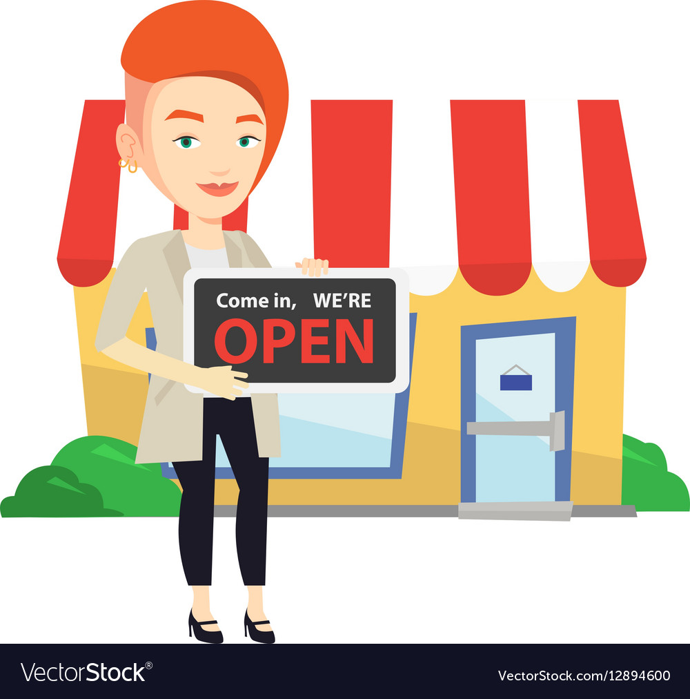 Female shop owner holding open signboard