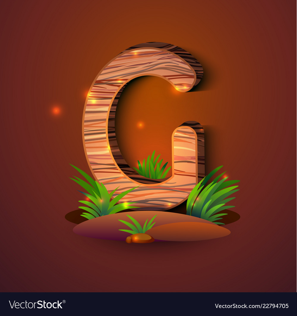 Wooden letter g decorated with grass