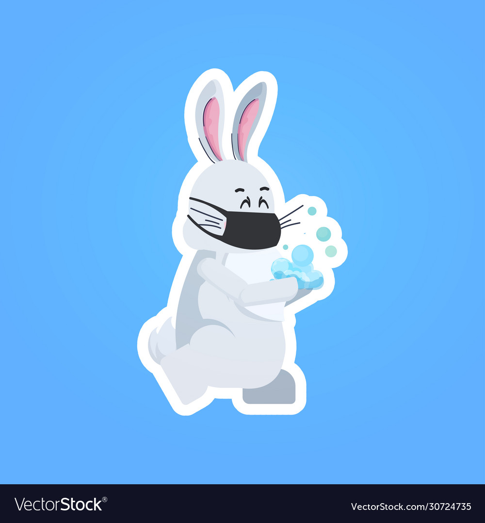 Rabbit in mask washing hands to prevent covid-19