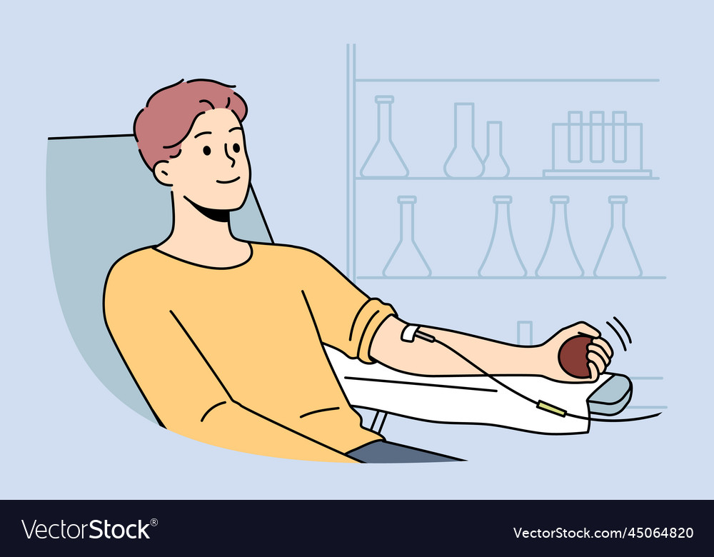 Smiling man with dropper in clinic