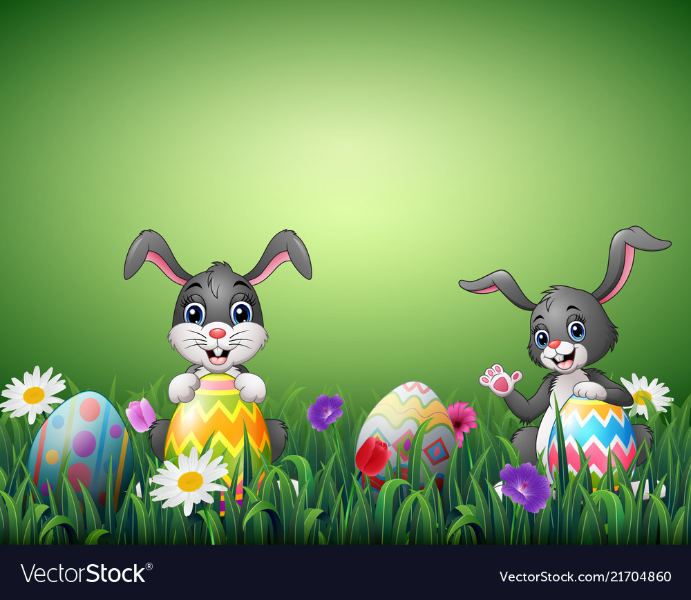 Two happy rabbit cartoons with easter eggs in a fi