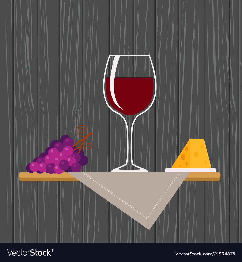 Glass of red wine with grapes and cheese