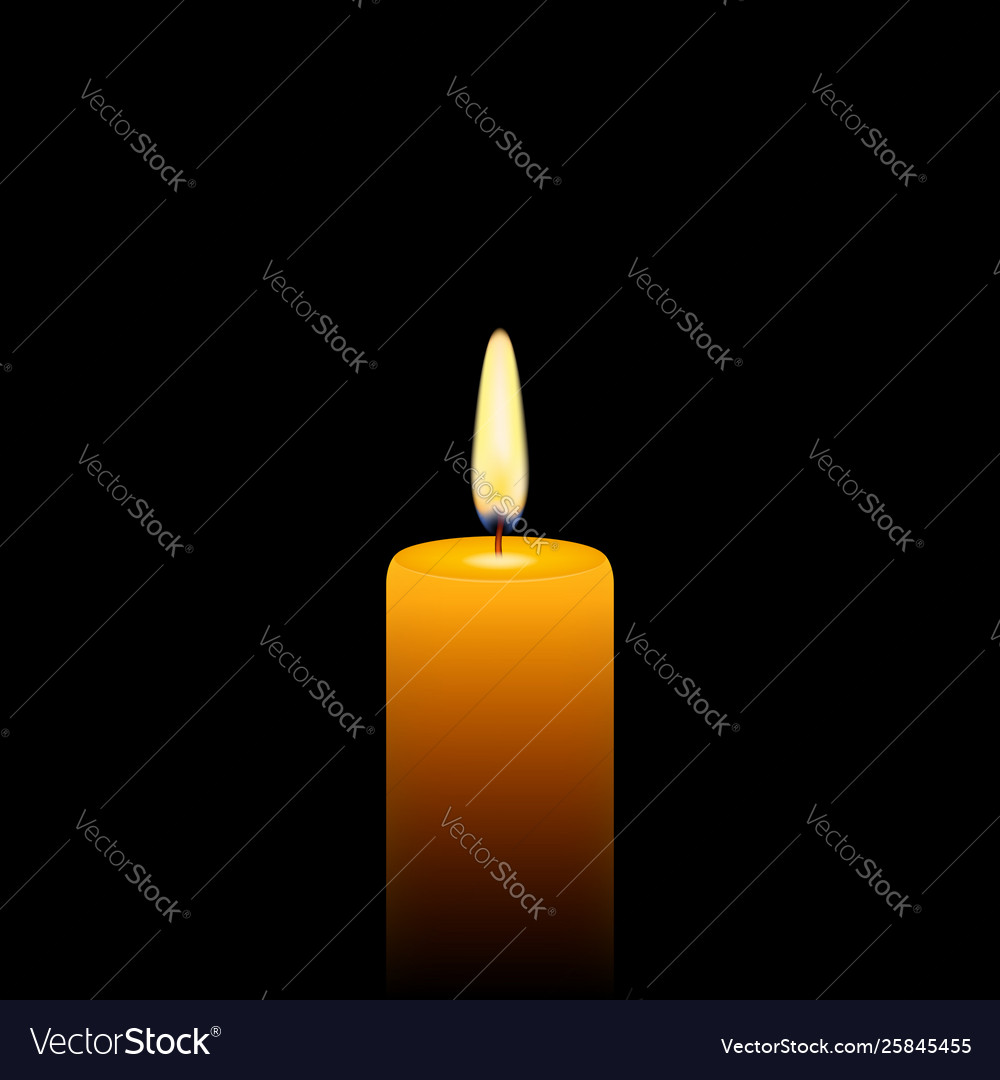 Stock yellow candle on black background