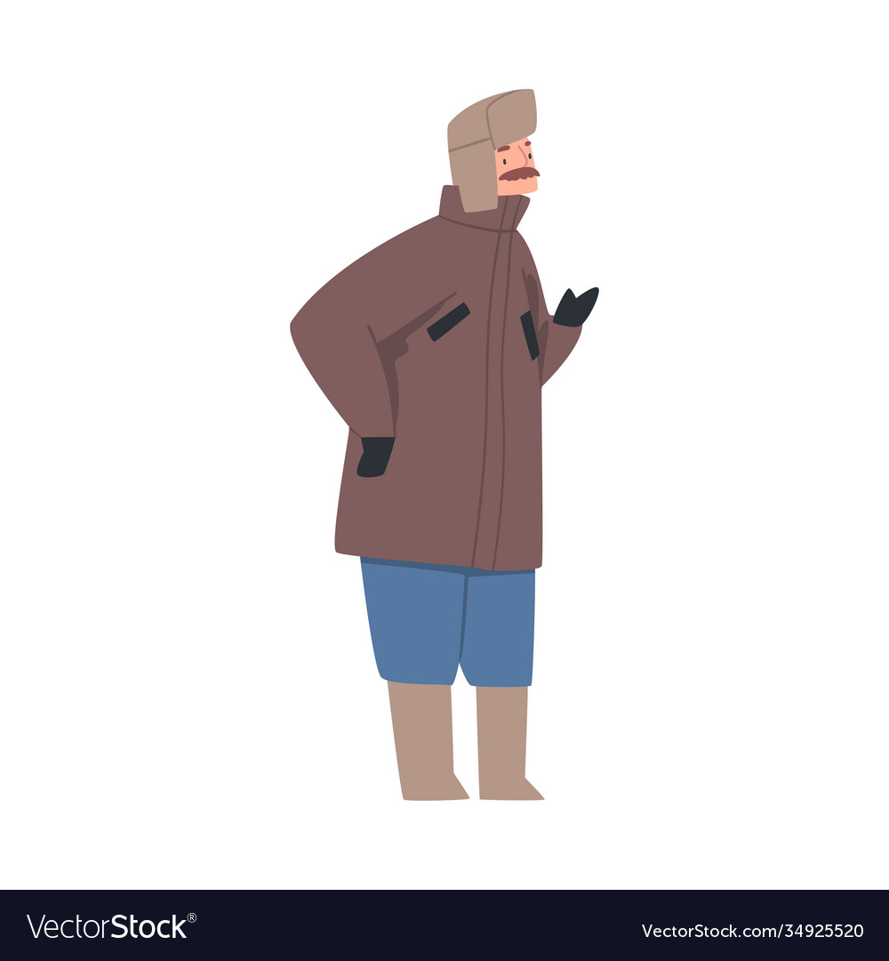 Bearded man wearing winter clothes felt boots