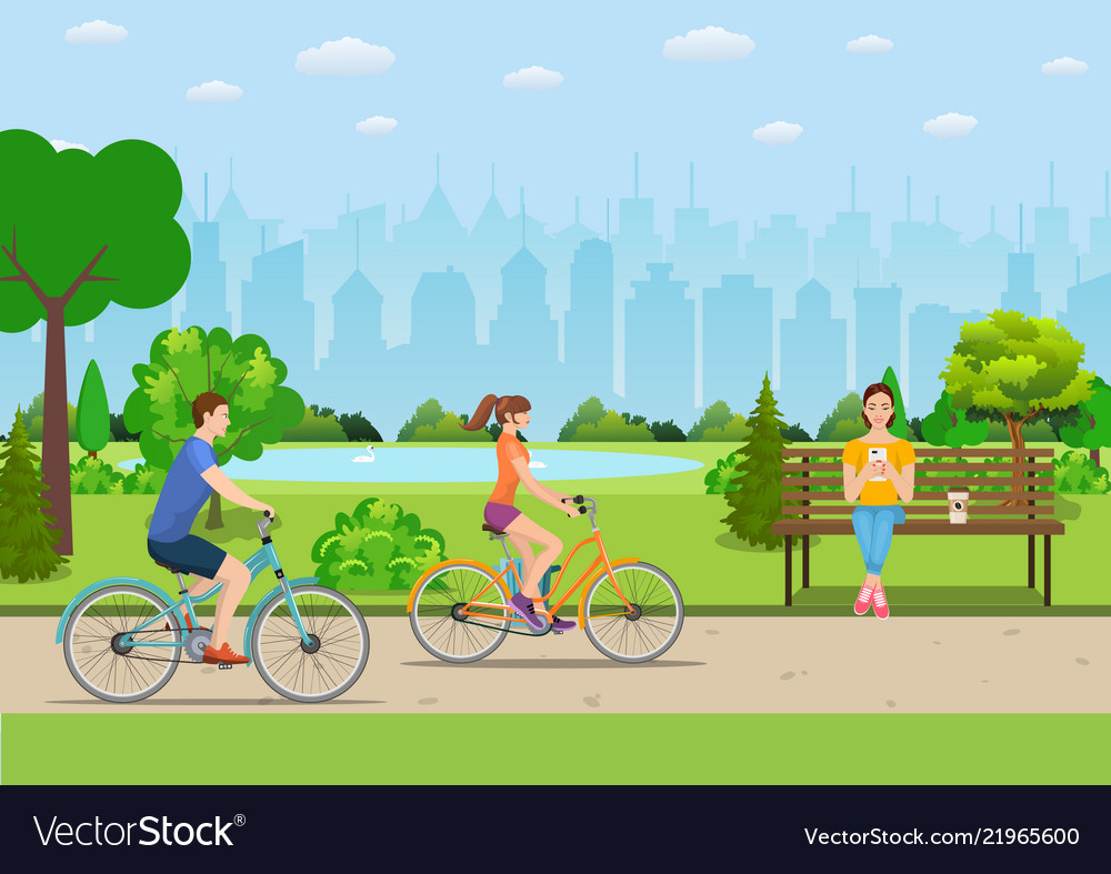 Couple riding bicycles in public park