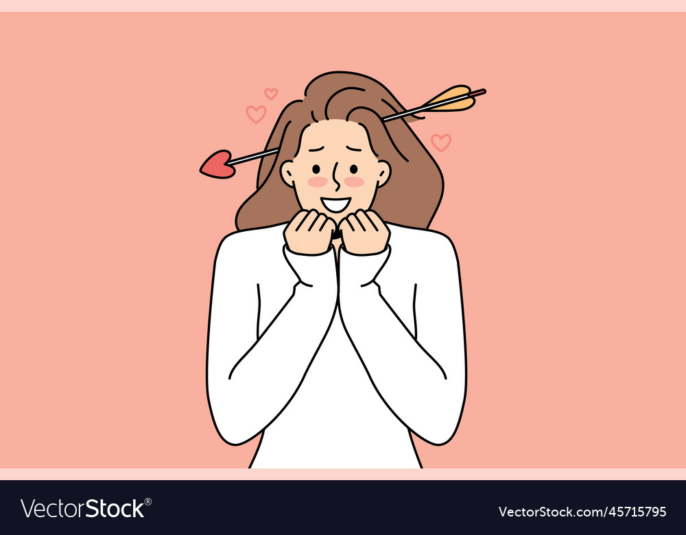 Smiling woman with cupid arrow in head