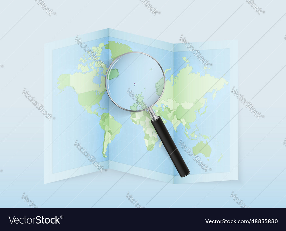 A folded world map with magnifying lens