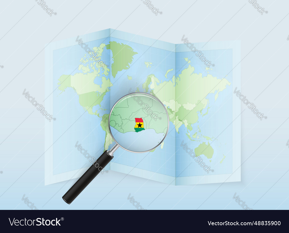 A folded world map with magnifying lens