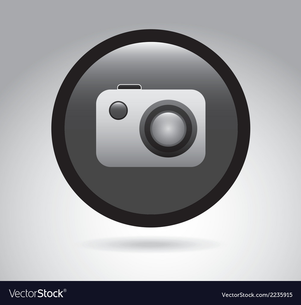 Button camera over gray background