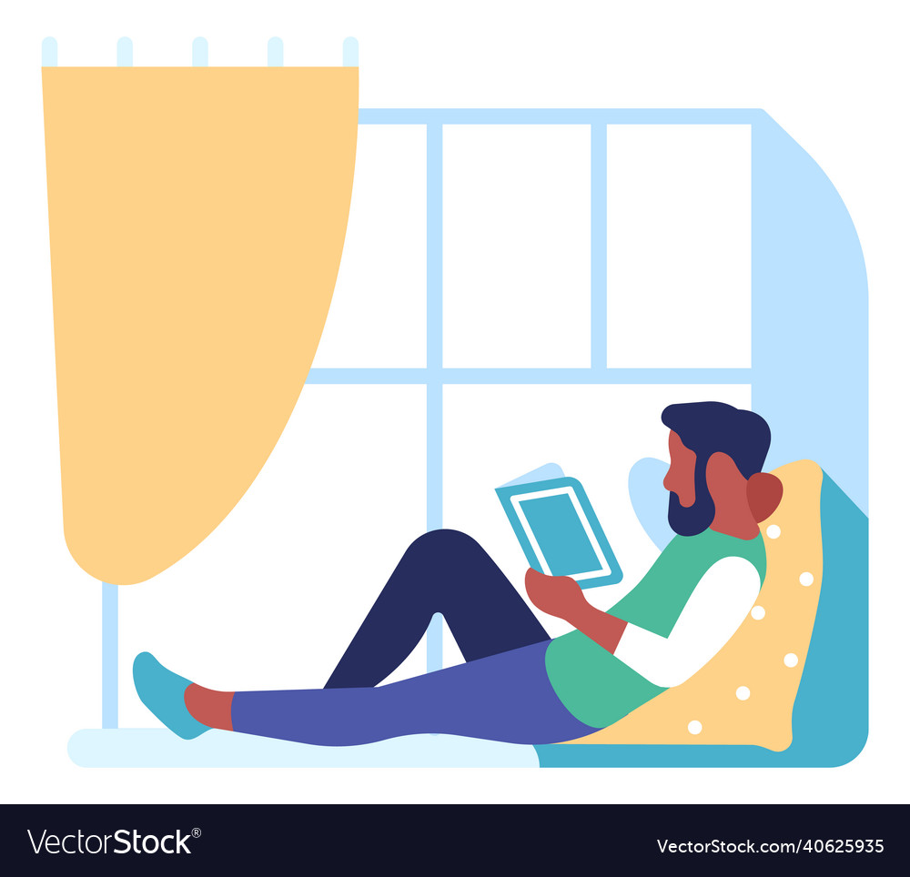 Man siting on floor with book home reading
