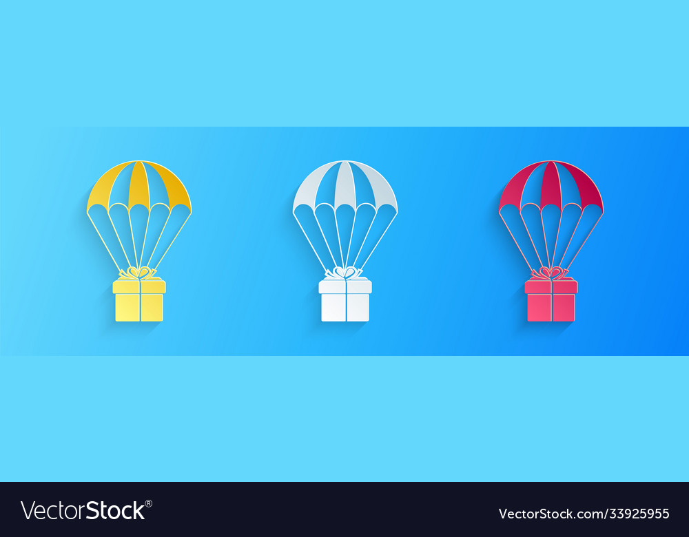 Paper cut gift box flying on parachute icon