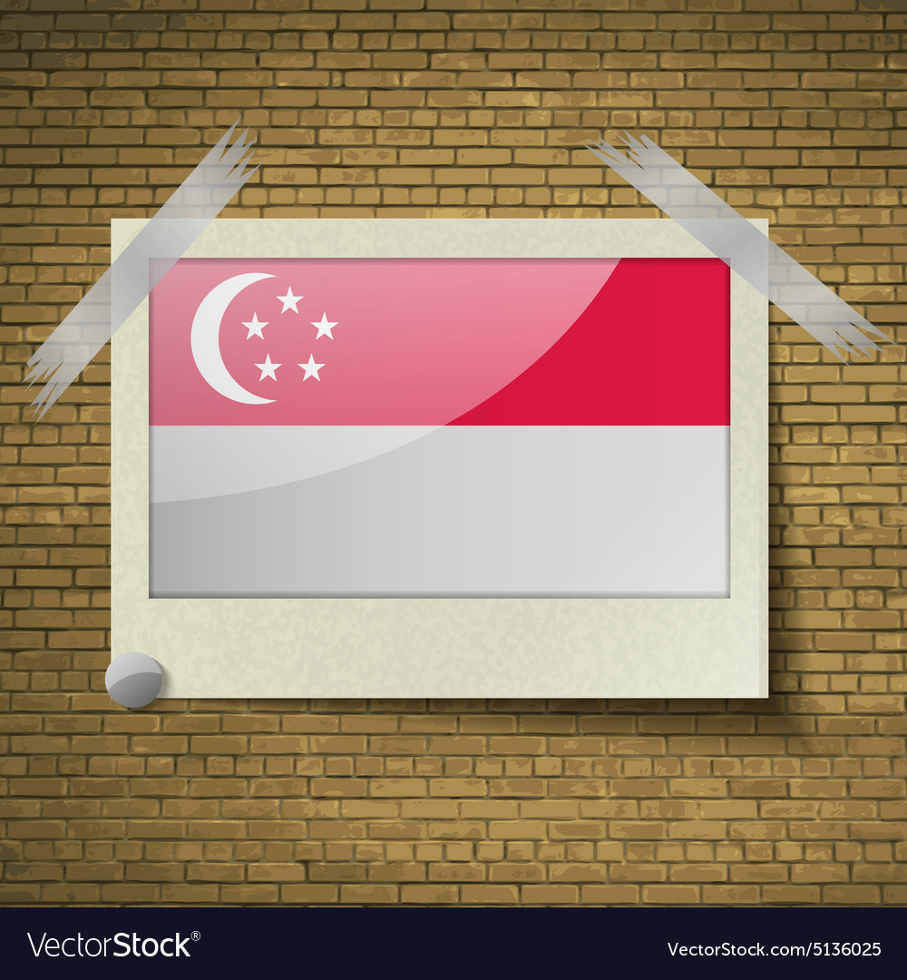 Flags singaporeat frame on a brick background