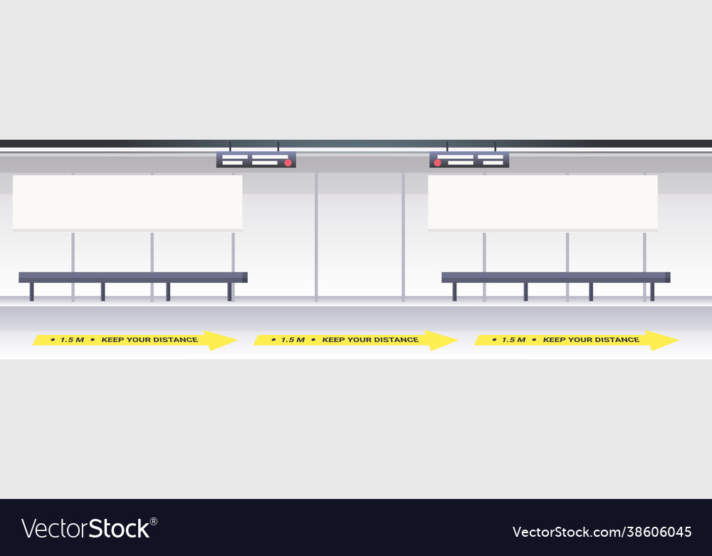 Subway platform with signs for social distancing