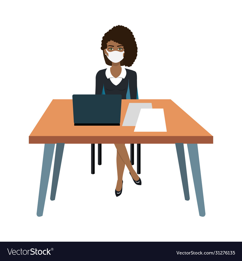 Business woman using face mask in workplace