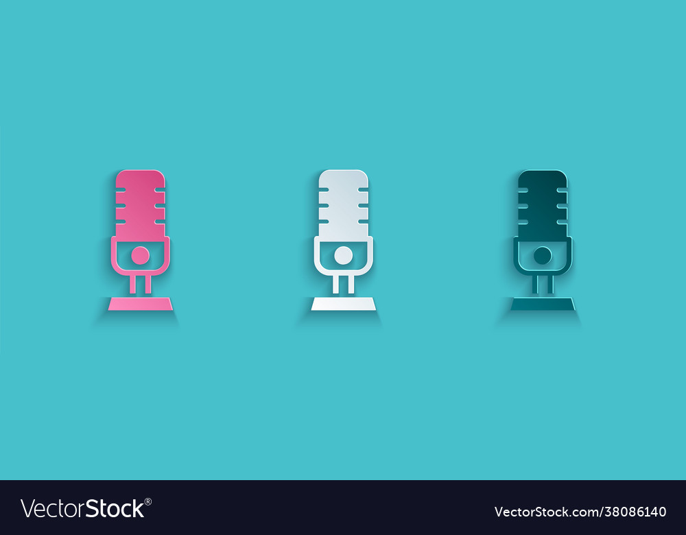 Paper cut microphone icon isolated on blue