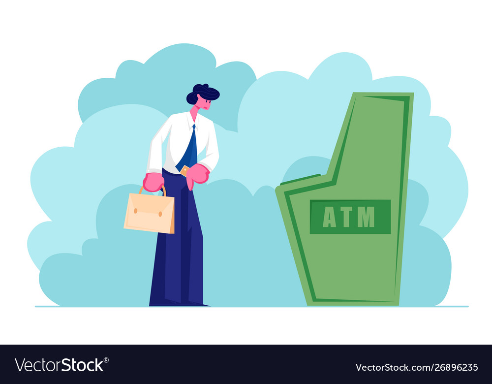 Man stand at automated teller machine holding