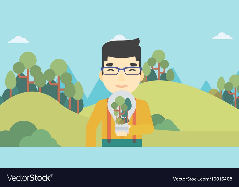 Man with lightbulb and trees inside