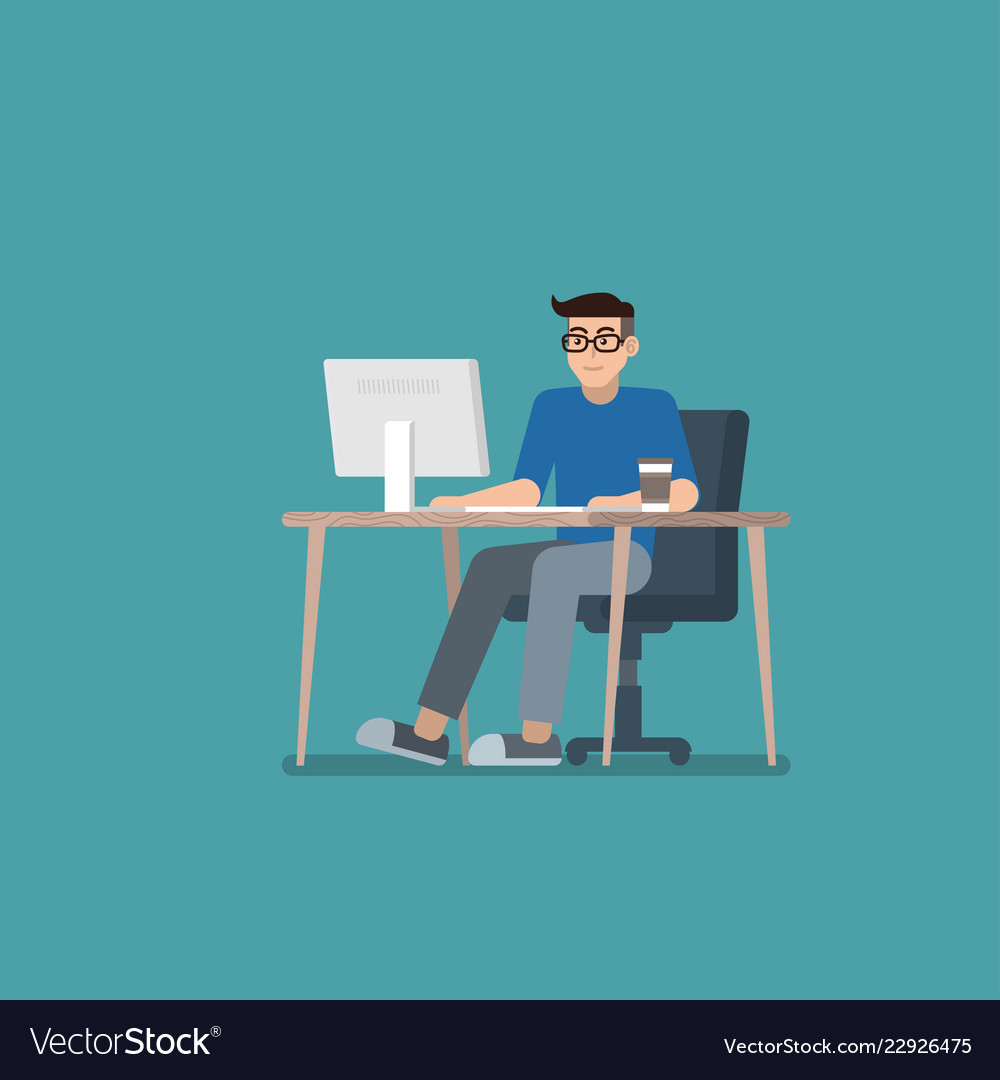 Man Using Computer at Desk