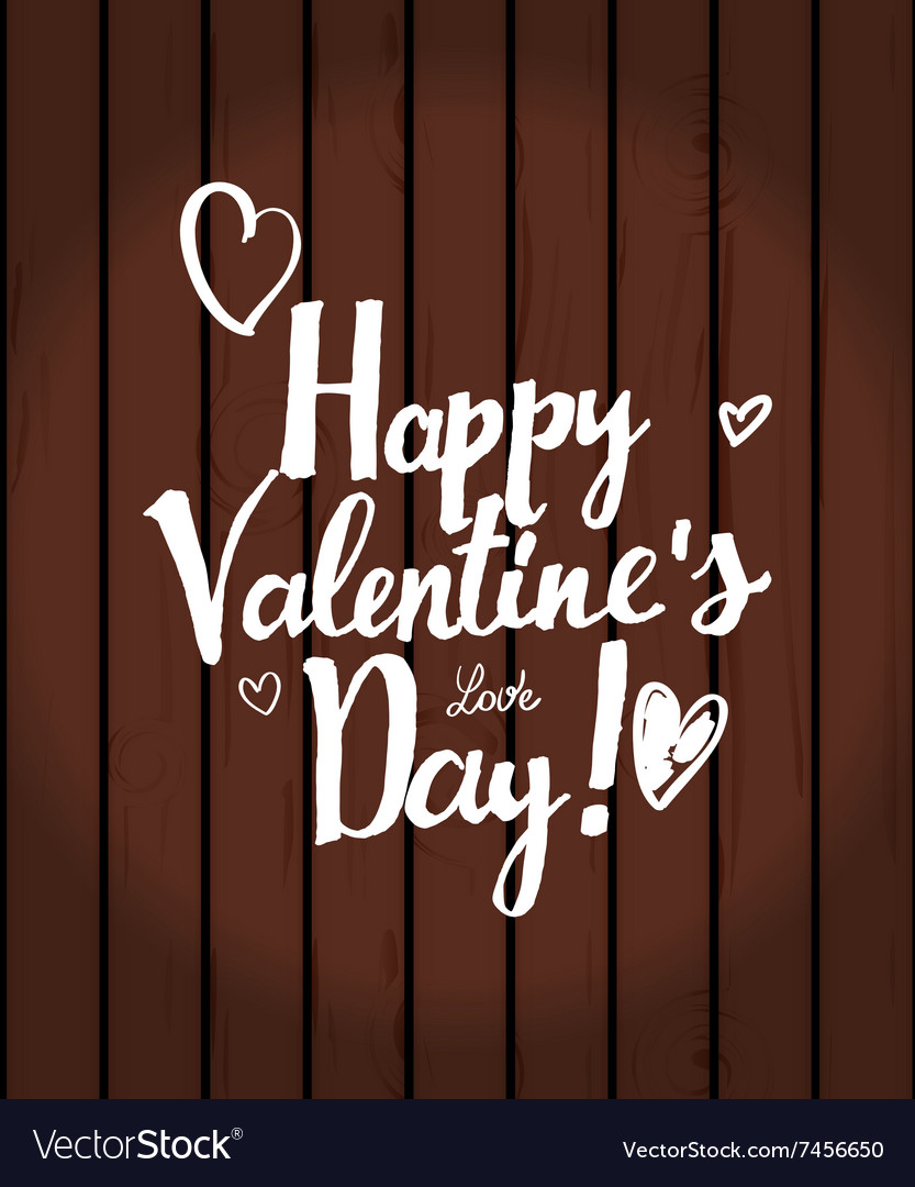 Valentines day inscription on wooden background