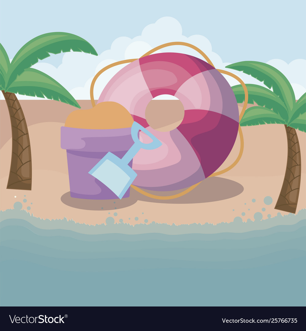 Summer beach scene with float and sand bucket