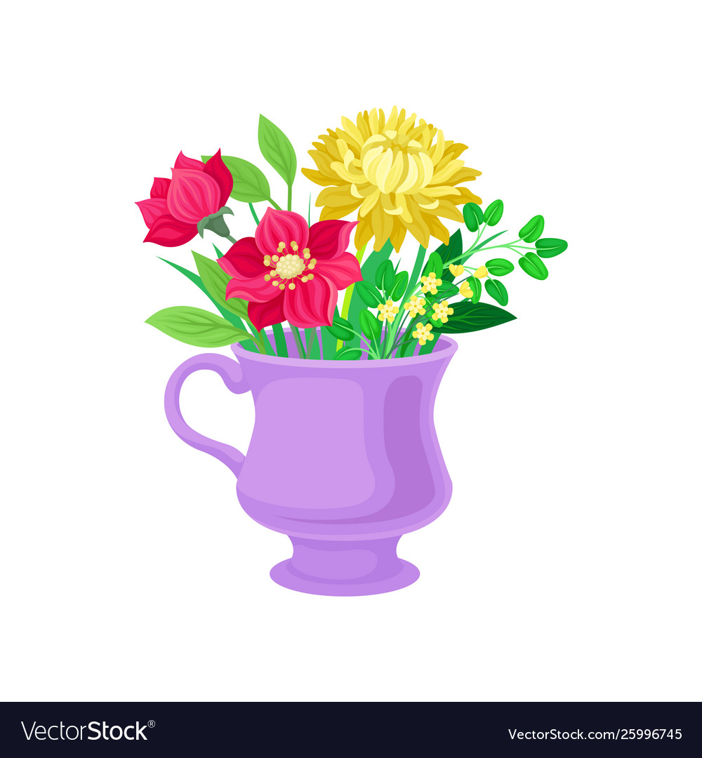 Red and yellow flowers in a mug