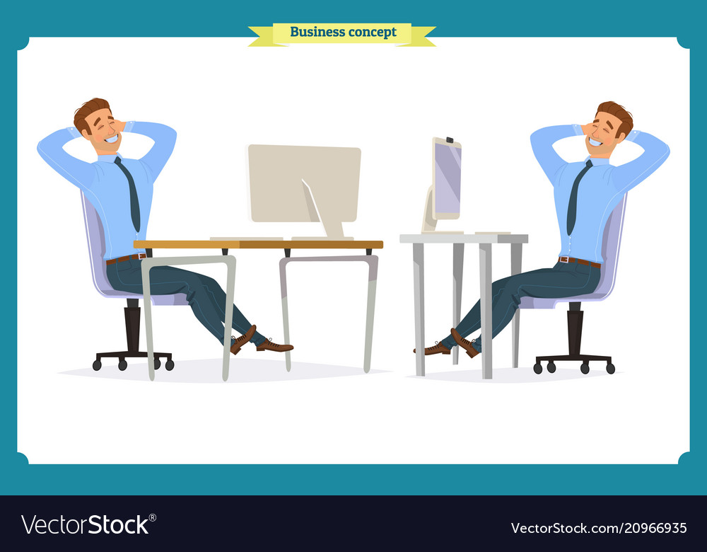 Male office worker poses sitting at computer