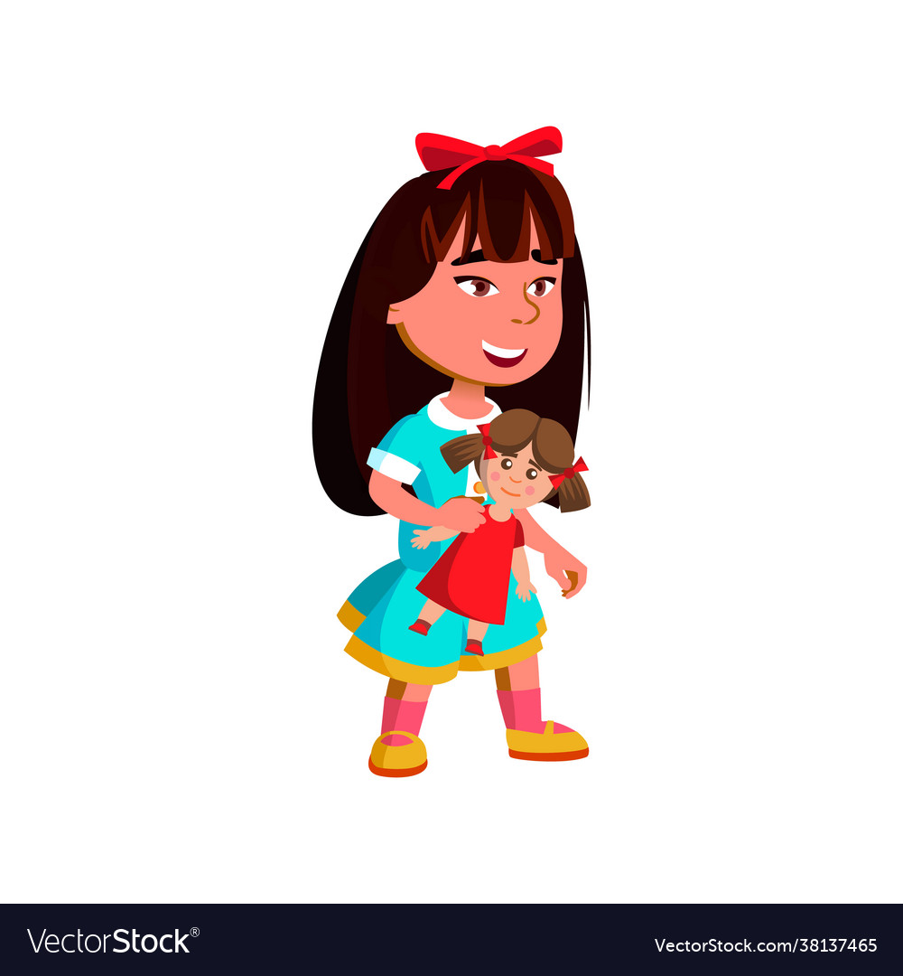 Small asian girl playing with doll in kindergarten