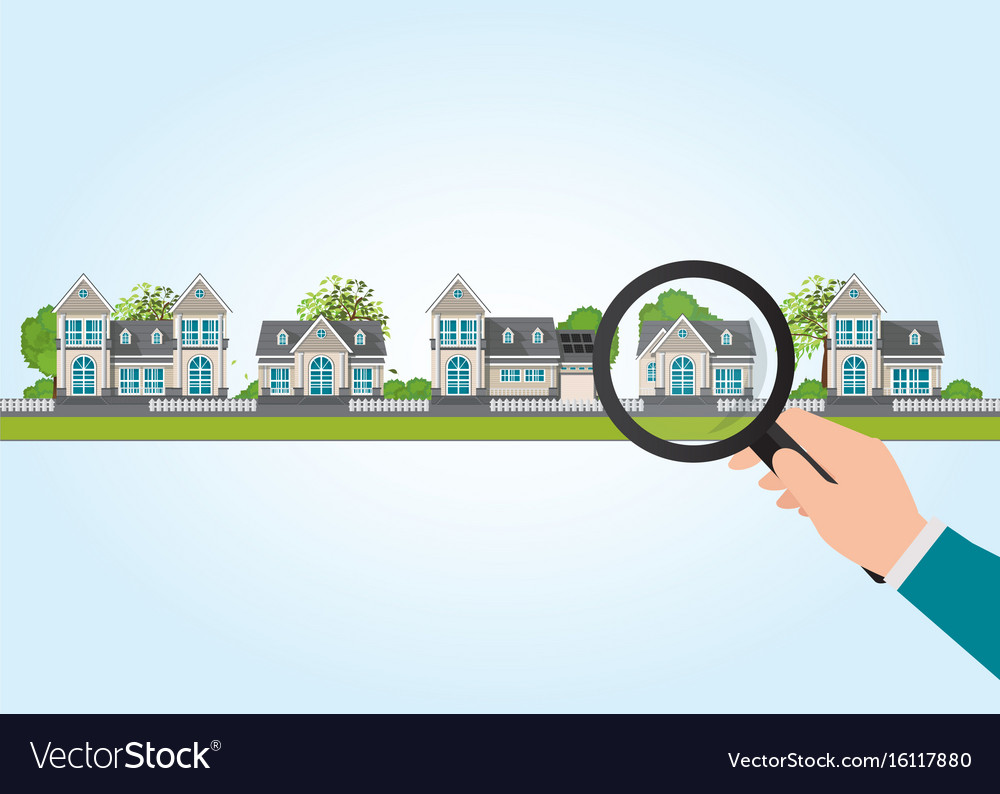 Magnifying glass in human hand with house icon