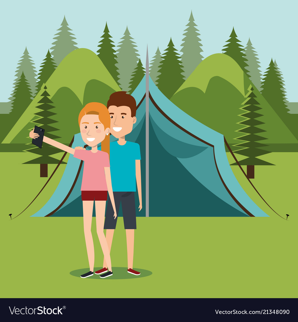 Couple with smartphones in the camping zone