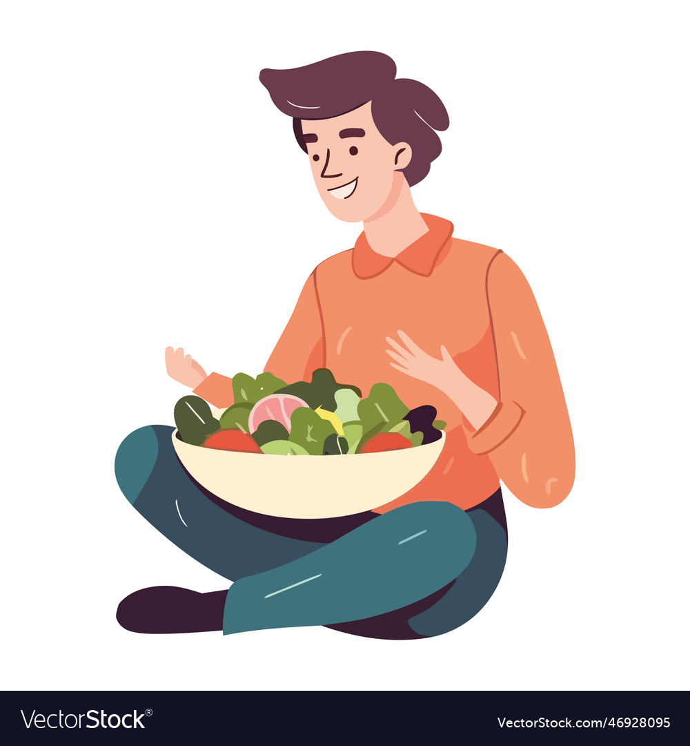 Smiling man eating healthy vegetarian gourmet meal