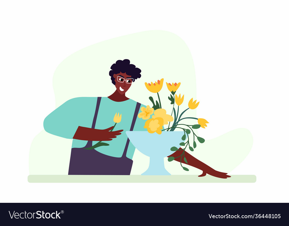 Man compose bouquet on table forist shop or store vector image Man compose bouquet on table forist shop or store