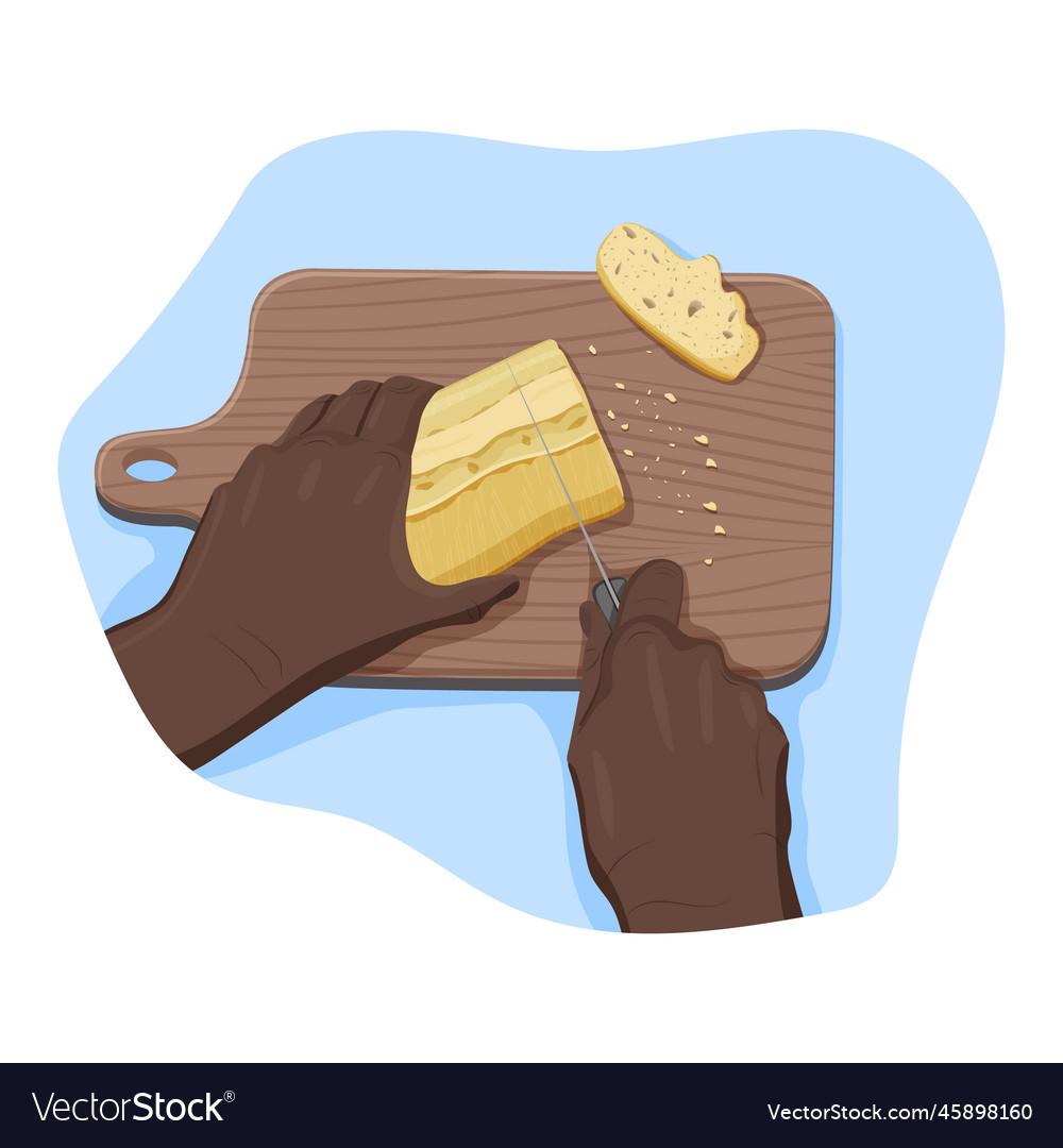 Hands of black person cut white bread with knife