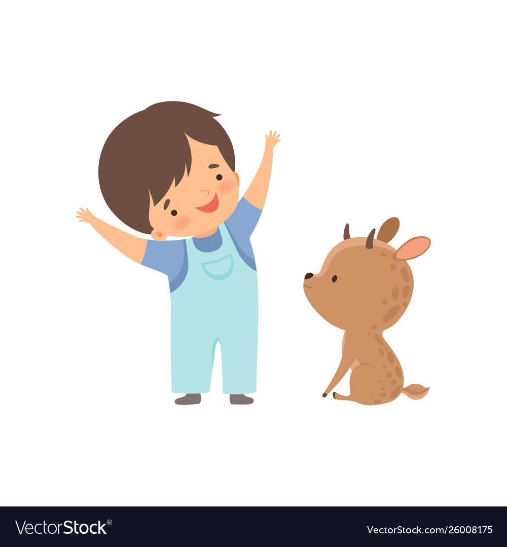 Cute boy playing with baby deer kid interacting