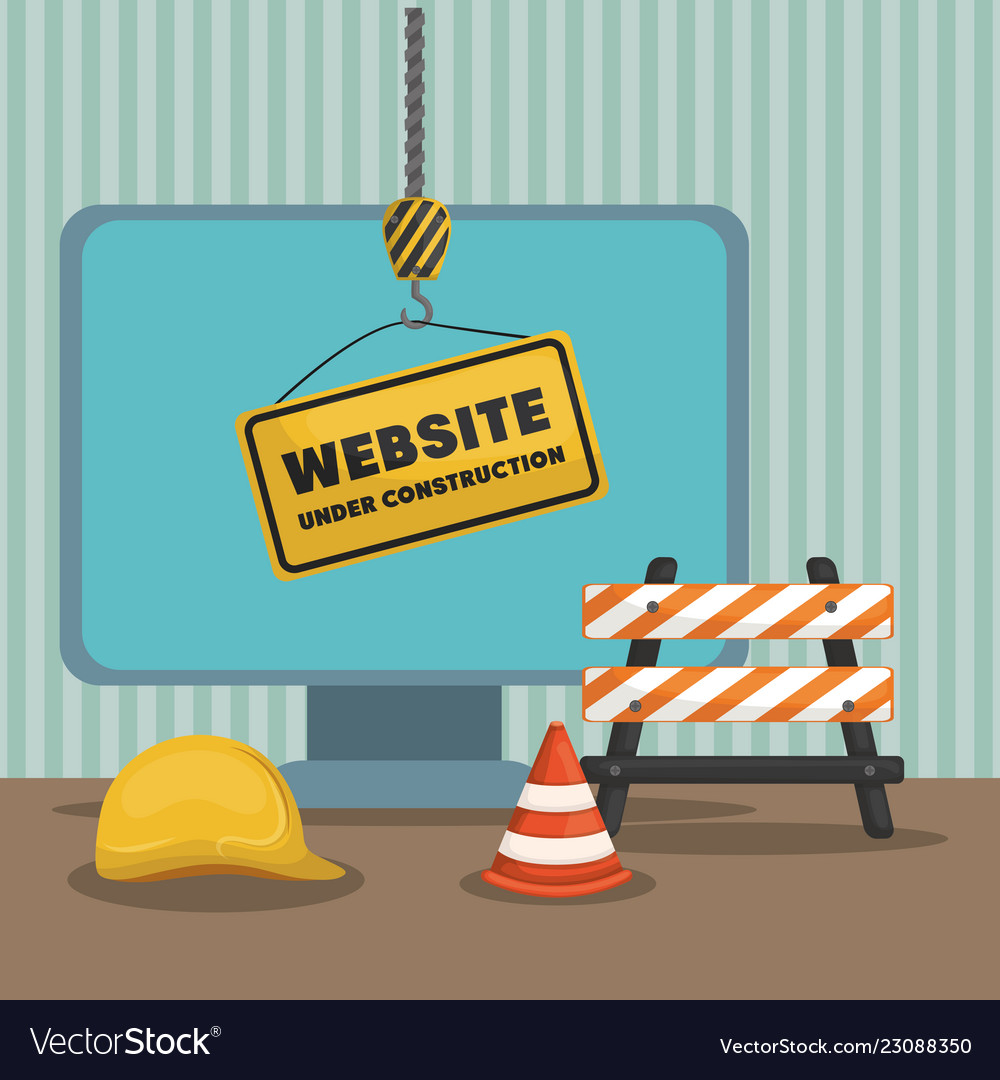 Website under construction with desktop computer