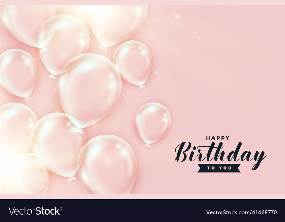 Shiny transparent birthday balloons on peach