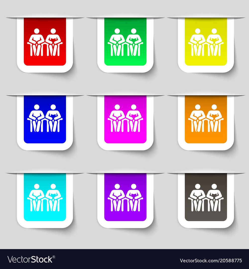Colorful icons and signs in the form of a button