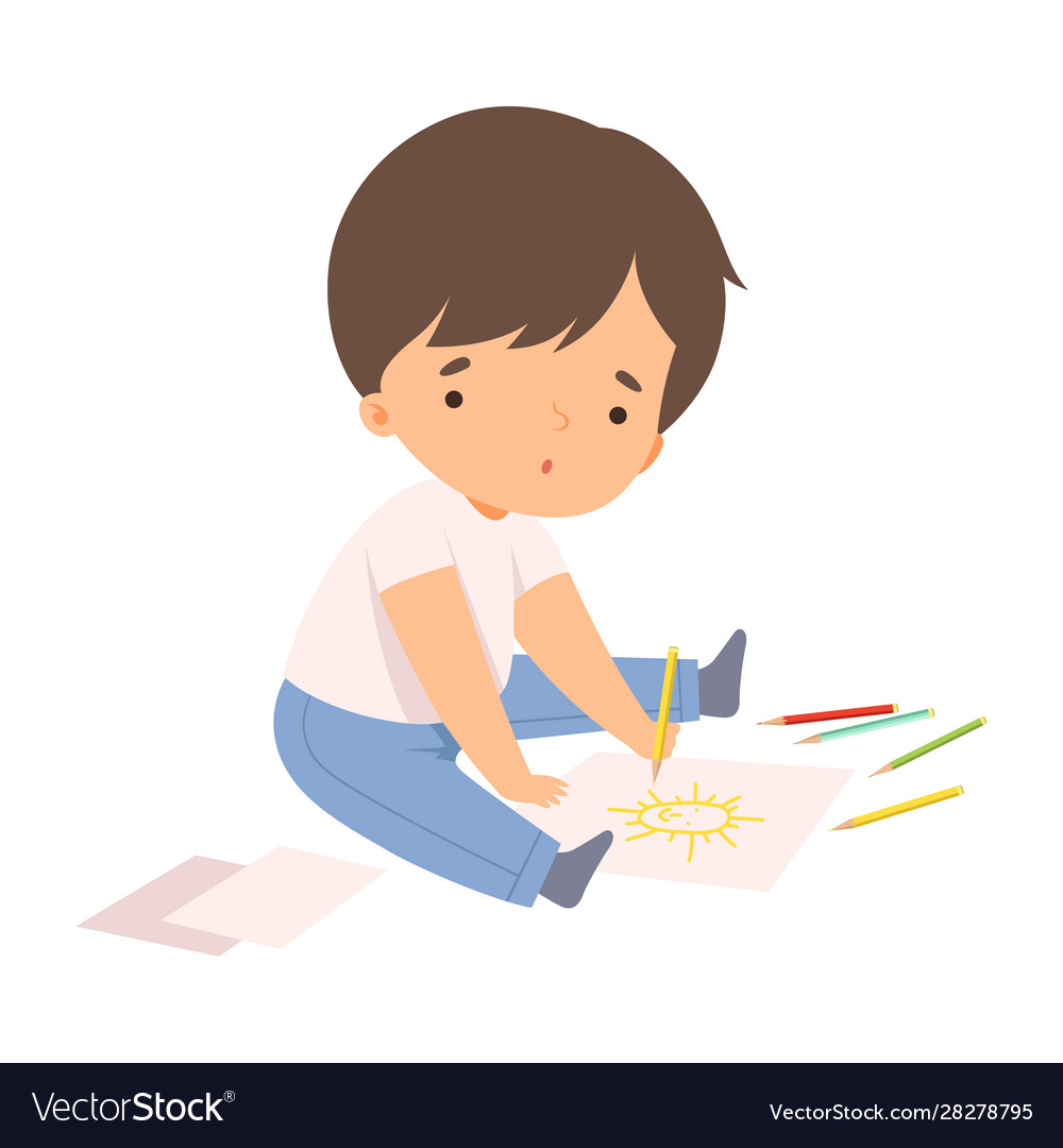 Cute boy sitting on floor and drawing sun