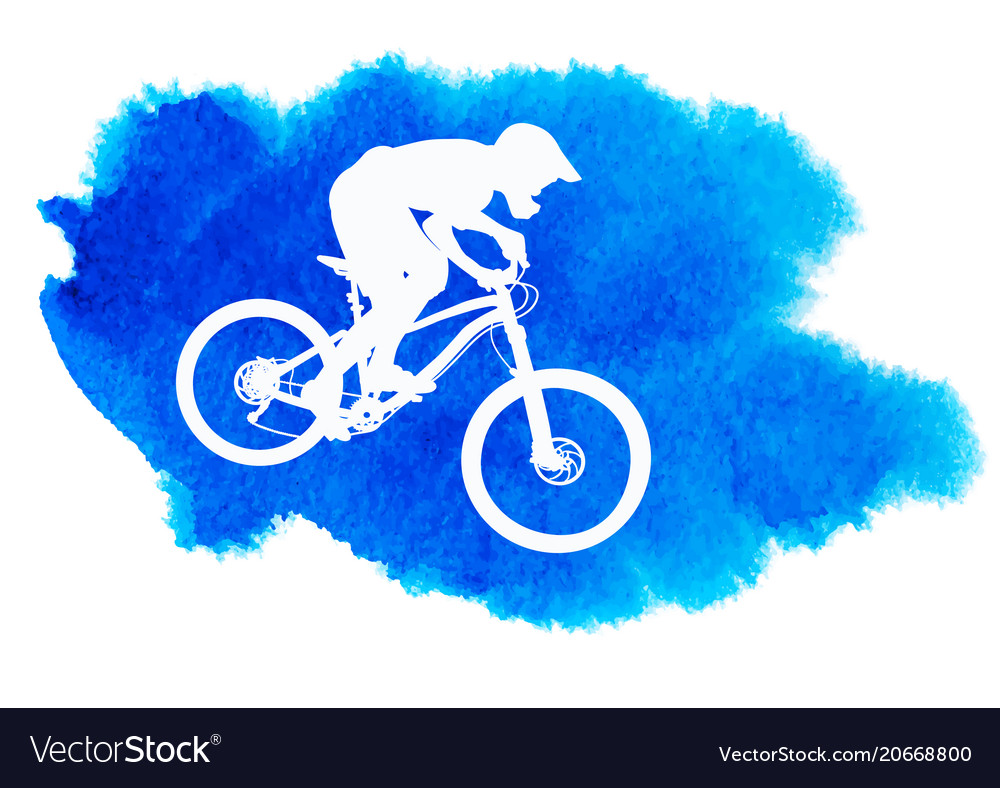 Silhouette of a cyclist riding mountain bike