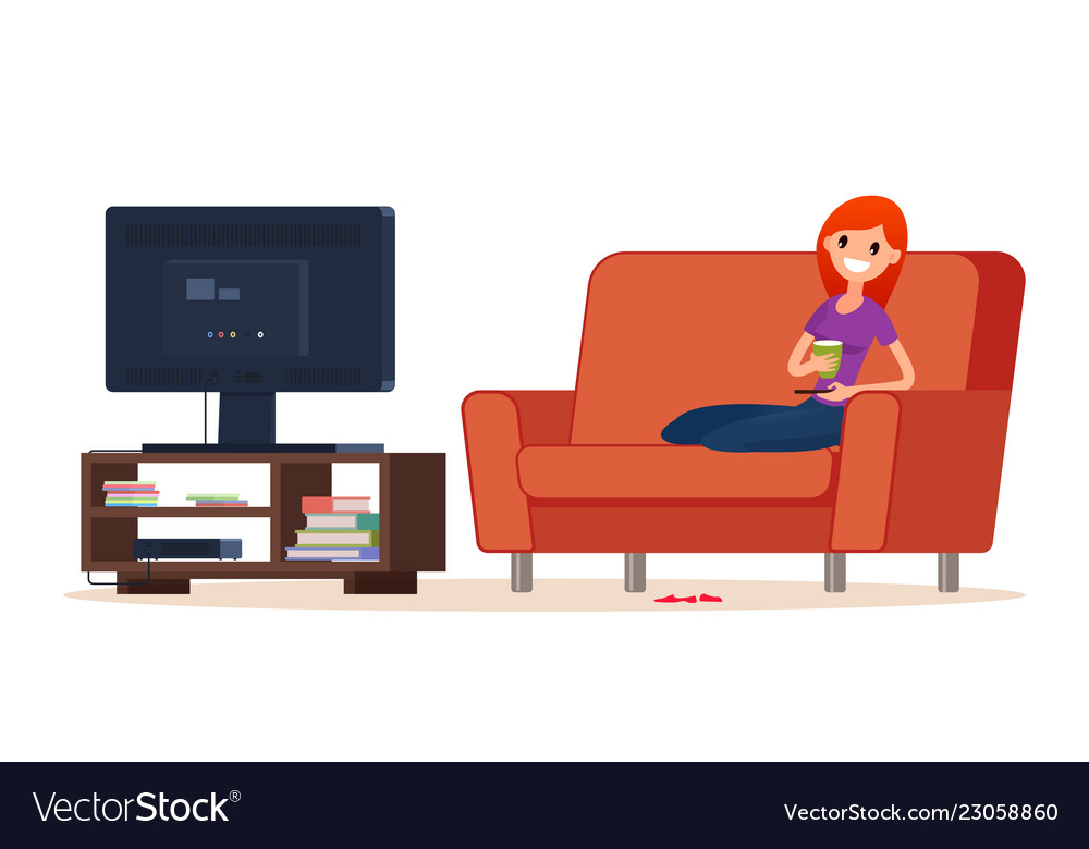 Young happy woman is watching tv