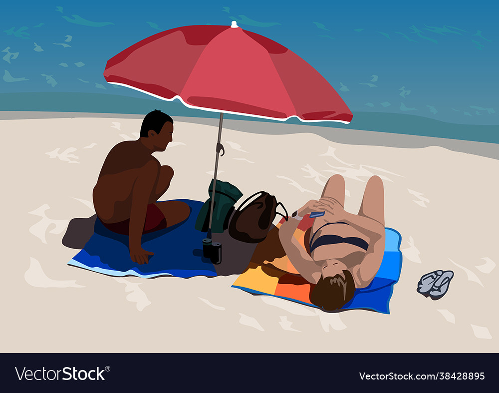 Sunbathing people on sandy beach