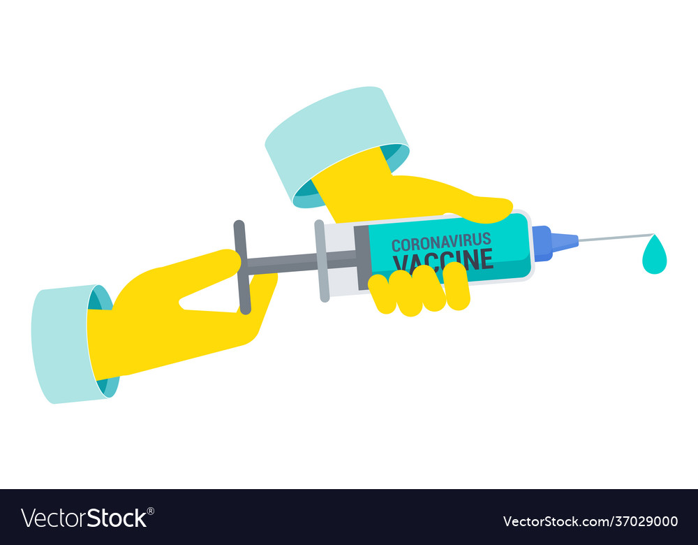 Doctor draws a coronavirus vaccine from bottle